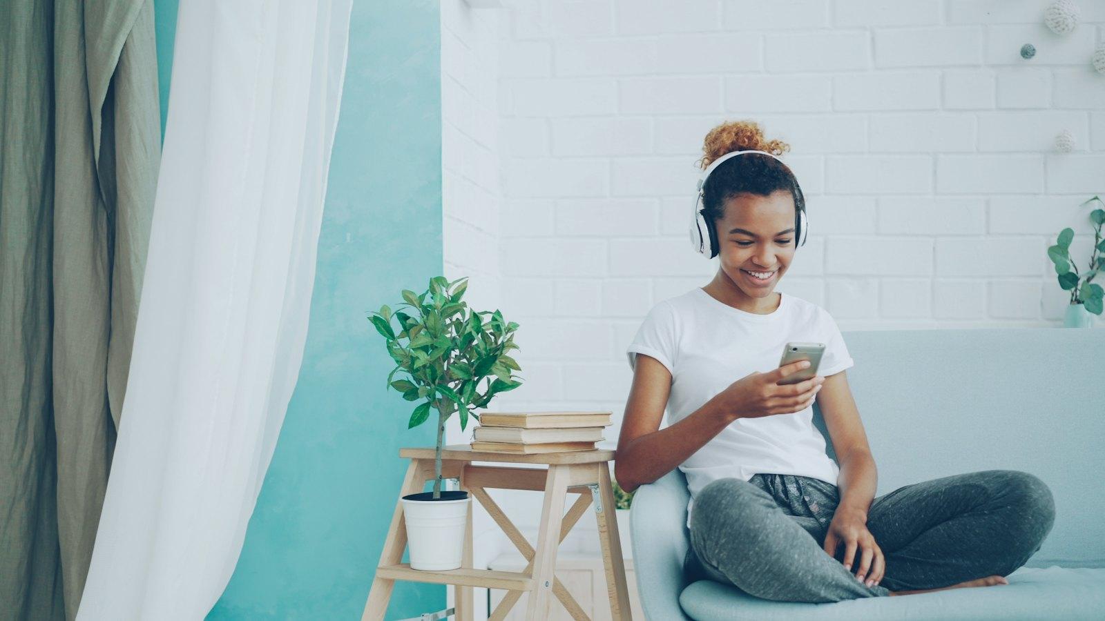 Woman smiling at a conversation on her phone